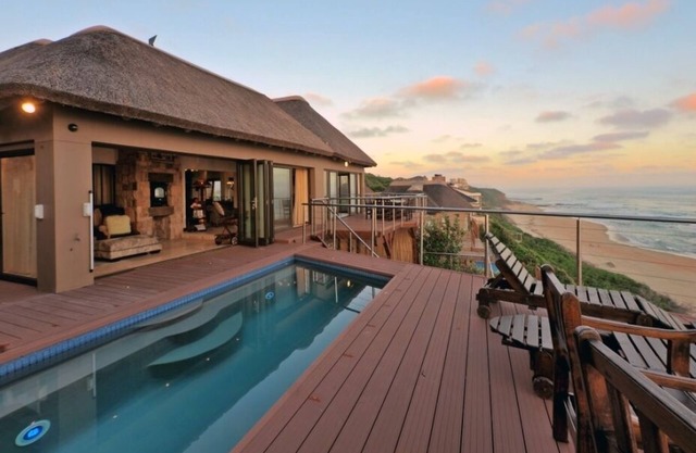 An exclusive and vast four bedroom/four bathroom house on the beach front