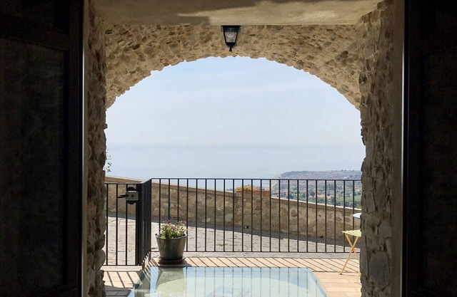 An historic luxury apartment with panoramic views over the Ionic coast and sea