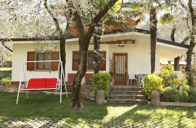 An oasis of calm and relaxation under the olive trees of Lake Garda.