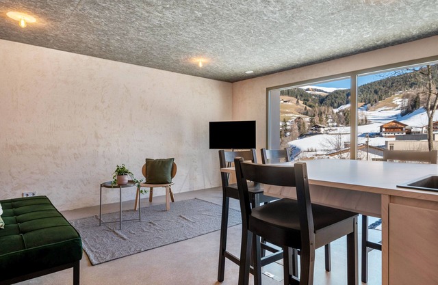 Apartment 'Lena Dolomites Gartensuite' with Mountain View, Private Terrace and Wi-Fi