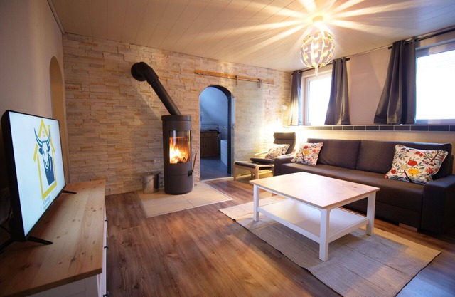 Apartment with 2 bedrooms, wood-burning stove, kitchen and terrace