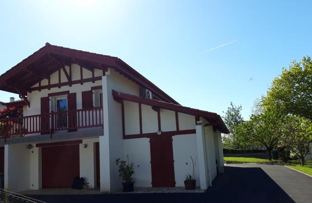 Appartement en rez de chaussee de maison