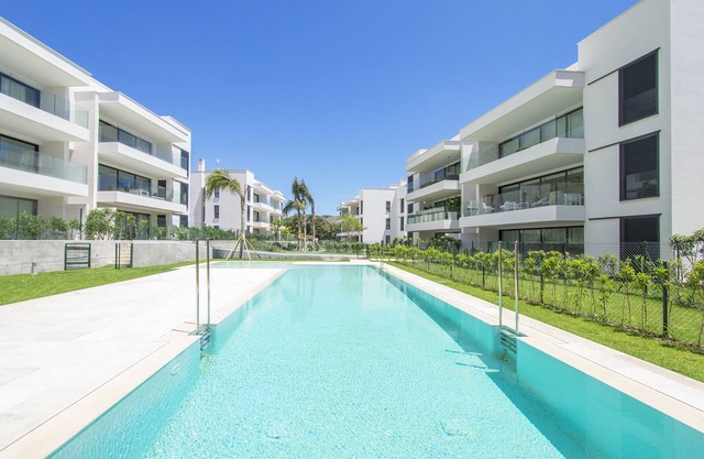 Apt Colomer community pool by JS VIllas