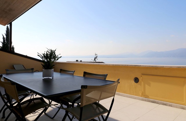 At Emy's house, with a terrace overlooking the lake