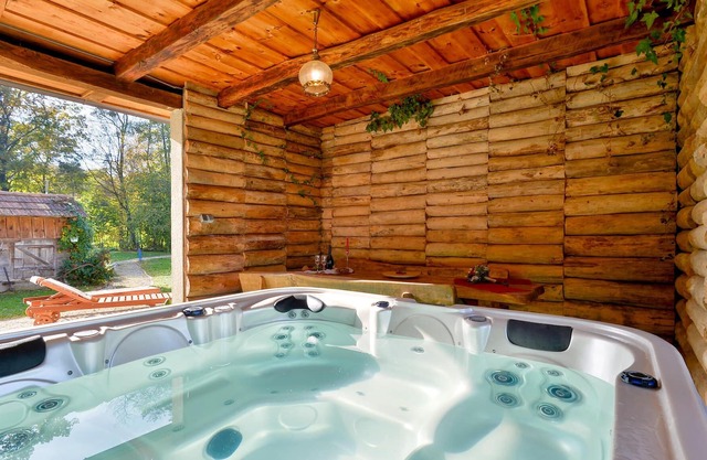 At the foot of the hill and in the shade of the forest, lies this rural cottage, furnished in old-fa