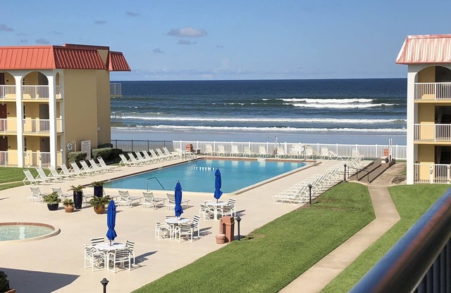 Beach front condo with ocean views and community pool. 2/2 on non drive beach.