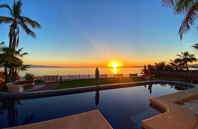 Beach-front luxury! Private home, pool, hot tub, rooftop and water sport access!