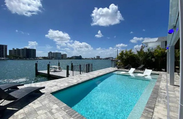 Beach House on the water with dock, pool & everything to enjoy the beach life.