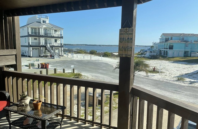 Beach View 2BR/2BA on Navarre Beach with beach wagon and chairs. Pet friendly