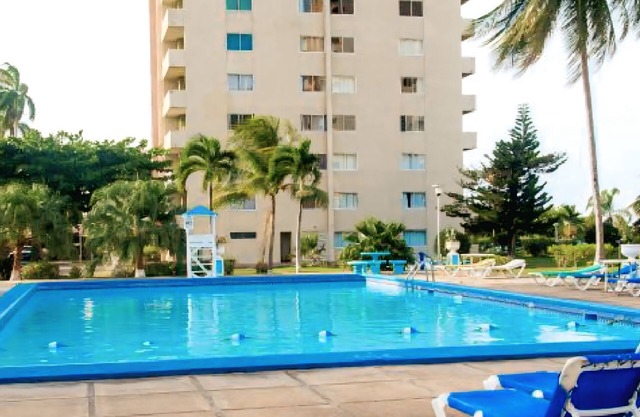 Beachfront Bliss 1-BR condo with Panoramic sea-View