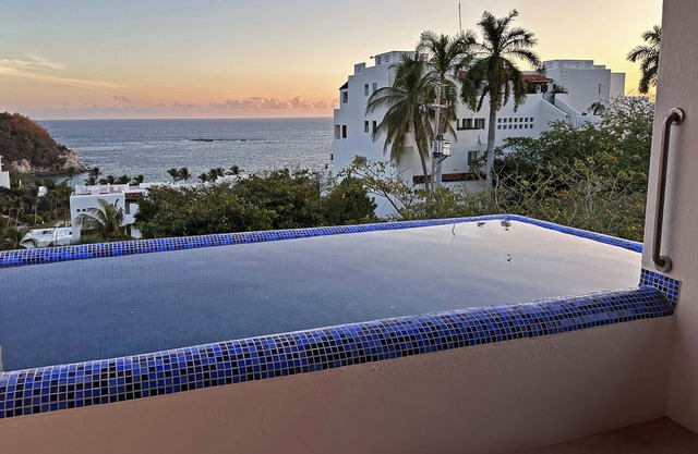 Beachfront condo with ocean view, private pool & resort amenities