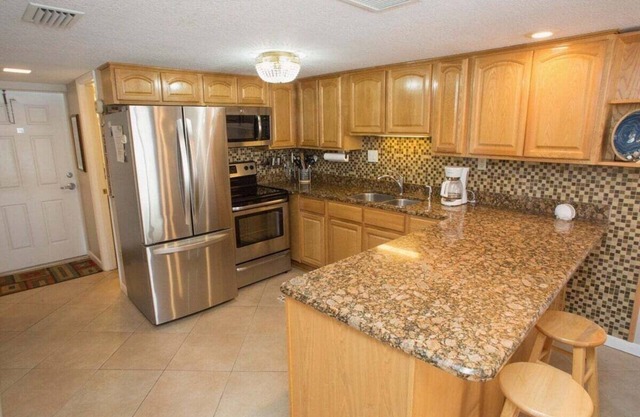 Beachfront Comfort w/Pool, Balcony & Steps to Flagler Avenue