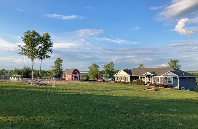 Beautiful 2800 sq ft., 4 bedroom country home with private beach and pool!