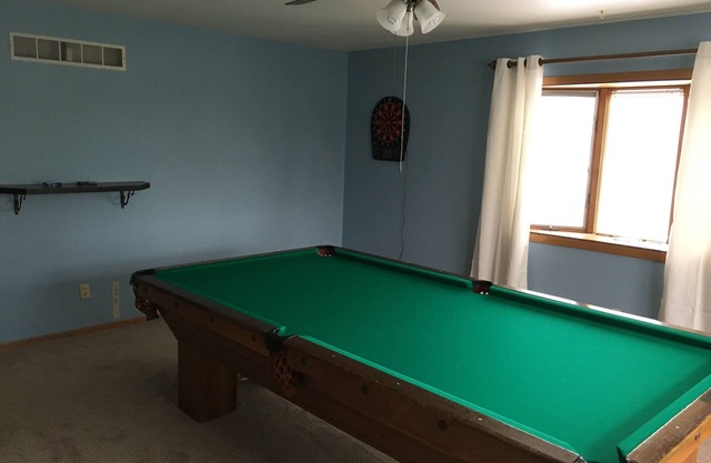 Beautiful 4 Bedroom 2.5 Bath with a pool table