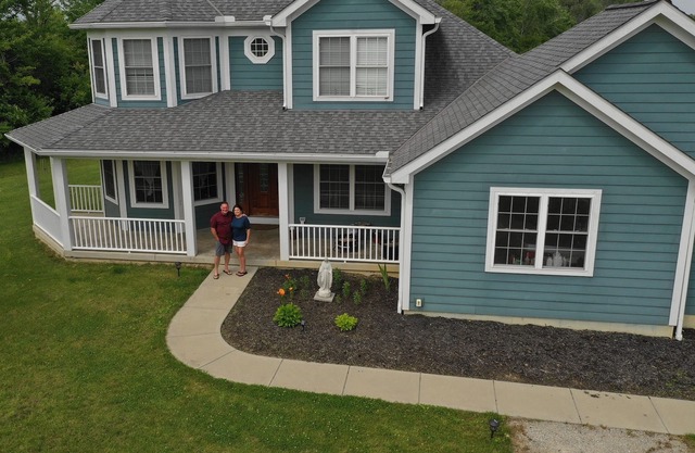 Beautiful Big Blue Dollhouse country home available for true comfort.
