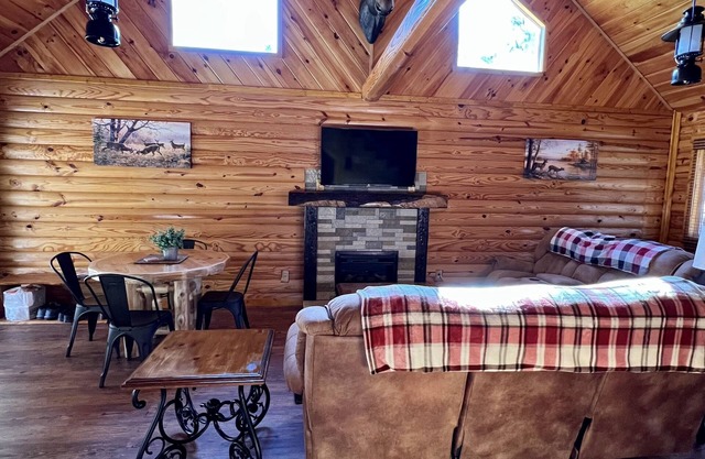 Beautiful cabin with fireplace and wrap around porch and private upstair balcony