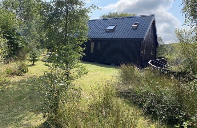 Beautiful cabin with log burner, wood fired hot tub and stunning views.