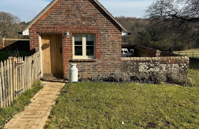 Beautiful cosy converted pigsties , set in 80 acres of woodland and meadows .