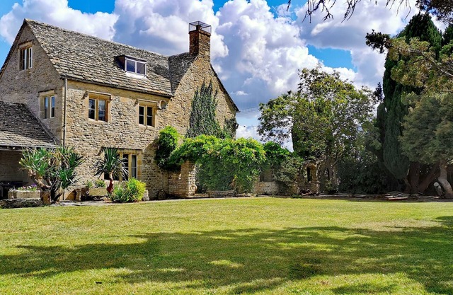 Beautiful Cotswolds farm house with period features and a beautiful garden.