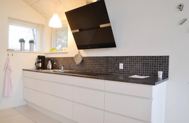 Beautiful cottage in a unique location right by the river Skjern Å with good fishing grounds.