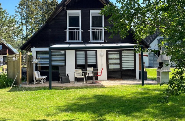 Beautiful holiday home on the edge of the forest in the Silbersee holiday park: Sky children's scooter bicycles