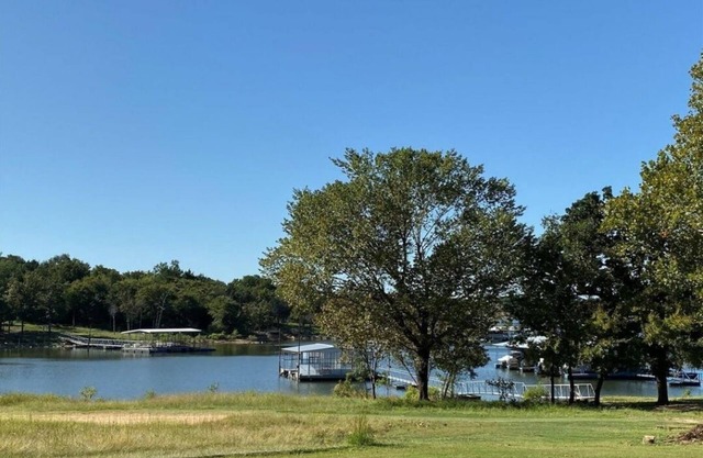 Beautiful Lake Front home w/sunroom, outdoor patio, hot tub