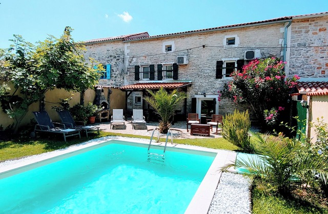 Beautiful large stone house with pool and garden, near Porec and the sea