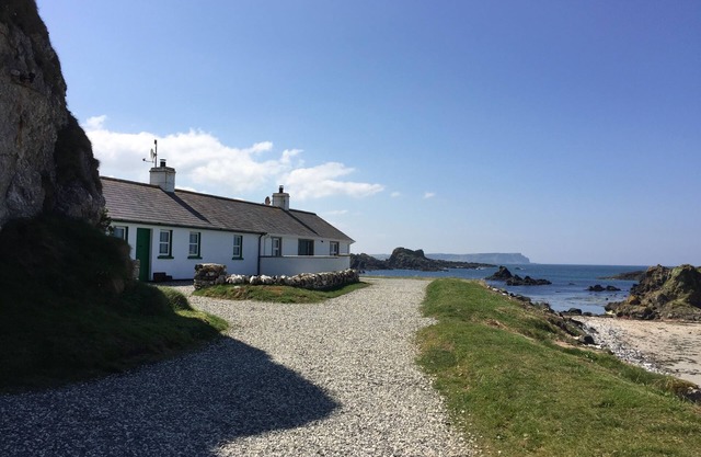 Beautiful seafront cottage, extensive private gardens, stunning sea views.