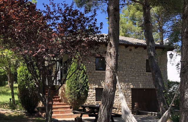 beautiful stone house with garden