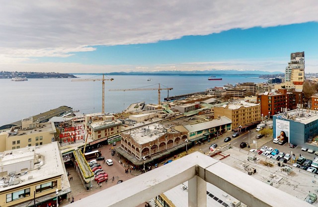 Beautiful water view condo with full kitchen, fitness area, & W/D