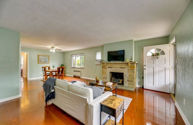 BEAUTIFULLY FURNISHED TWO-BEDROOM UNIT, LOADED WITH APPLIANCES AND PARKING