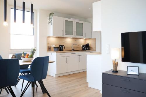 BeltBlick 4 - Moderne Ferienwohnung direkt am Strand mit Sauna und Meerblick!