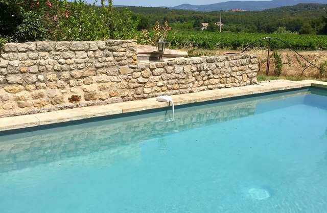 Between Gordes & Roussillon, period farmhouse with swimming pool set amidst vineyards