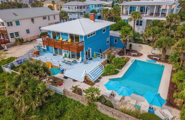 Blue dolphin beach front cottage 5 star home- large private pool - one of a kind