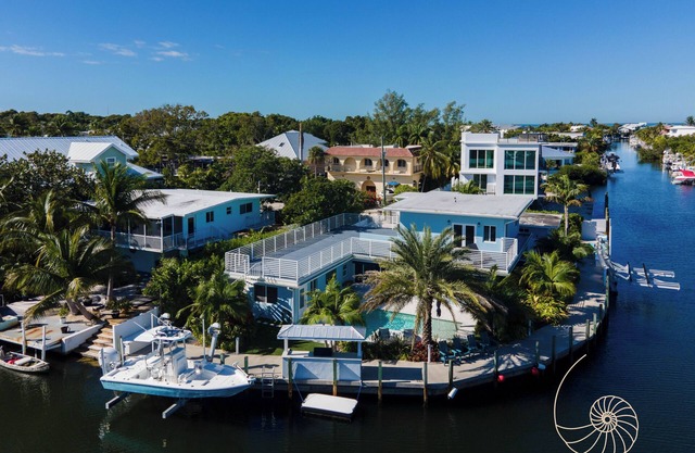 Blue Palm Oasis ~ 4 Bedroom Plantation Key Home w/Pool & 170` of Dockage