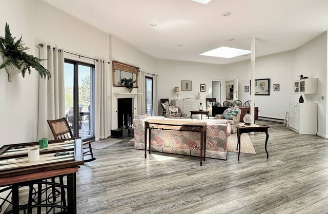 Bright and airy home with sunset views less than a mile to the lake and village