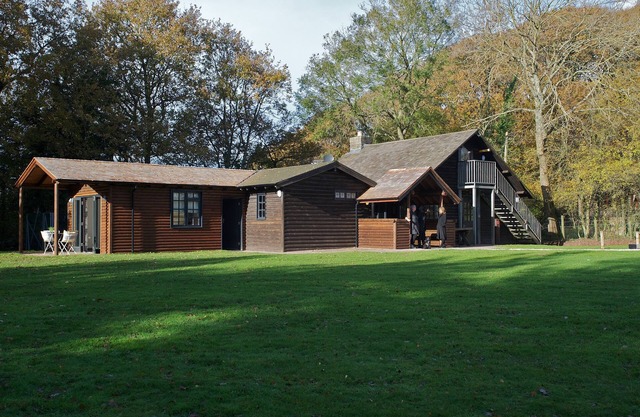 Buckstone Log Cabin with Private Grounds Nestled Into The Natural Woodland