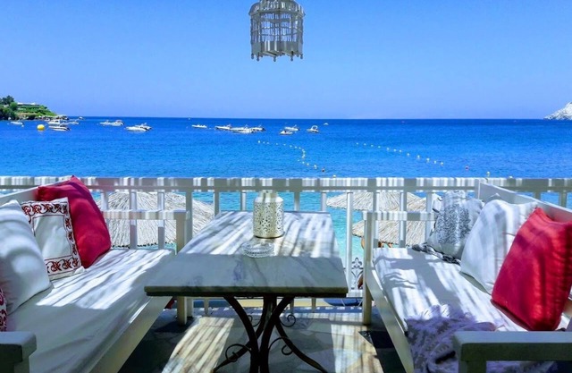 By the Sea beachfront luxury apartment with a large patio