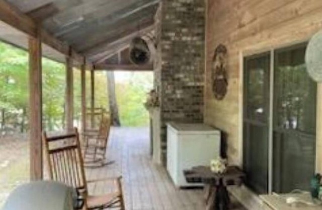 Cabin in the woods overlooking Grenada lake.