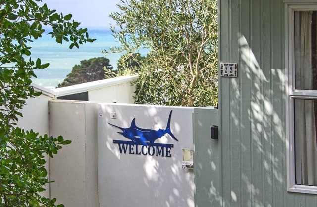 Castlepoint - Private family beach home with stunning views capturing the sun.