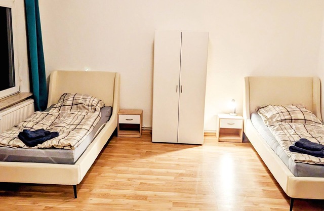 Central apartment with 3 single beds + washing machine + wifi
