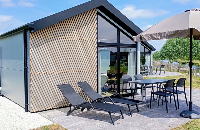 Chalet Casa Kampen with waterfront plot, jetty and fence for 4 people in Kampen