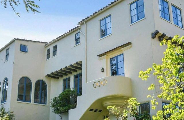 Charming 1924 unit with garden, modern updates, and serene Berkeley views.
