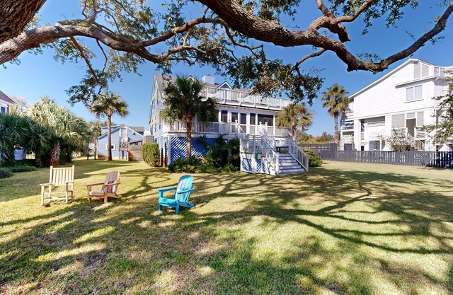 Charming 2,704 Square Foot Beach Home with Balconies & Lush Yard
