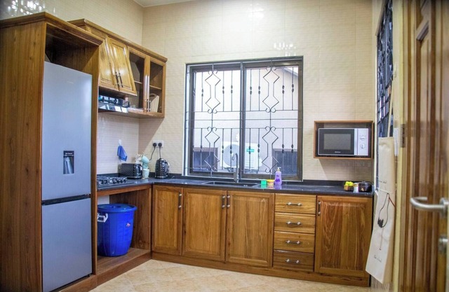 Charming 2-bedroom house in beautiful Mbezi Beach, Dar es Salaam with WiFi, AC