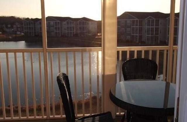 Charming 2 Bedroom/2 Bath Condo with Screened in Porch Villages at Five Points