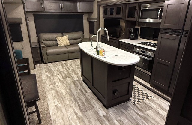 Charming 2-bedroom RV with AC and WiFi with outdoor living area