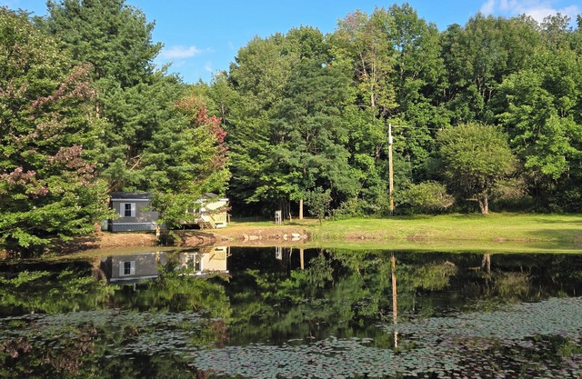 Charming 3-bedroom home in welcoming Laurens with 11 acres and a small pond