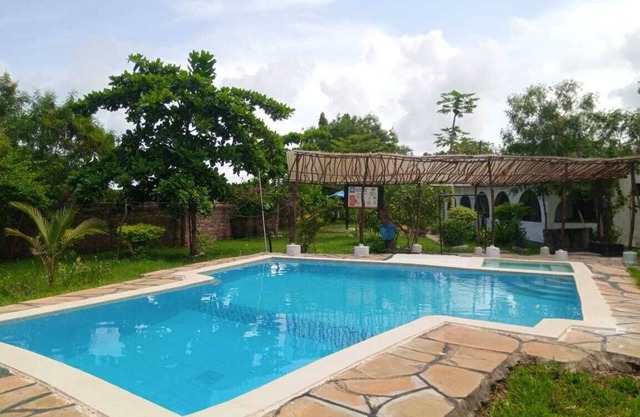 Charming 4-bedroom bungalow in fabulous Mombasa Tiwi beach with pool.