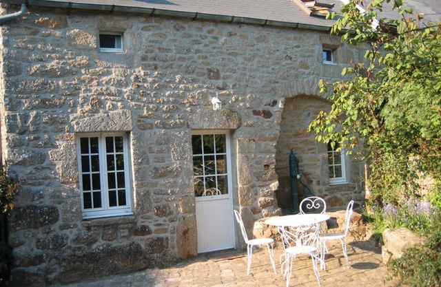 Charming Coastal Cottage with Fireplace, WiFi, Terrace, and Garage - Pets Welcome!